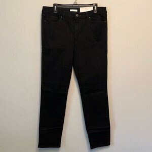 LC • Black mid rise skinny jeans
